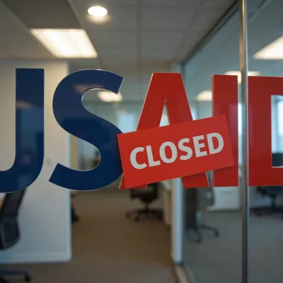 AI-generated image of a USAID office door with a "closed" sign across it