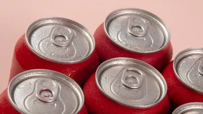 Close up photo of the tops of soda cans