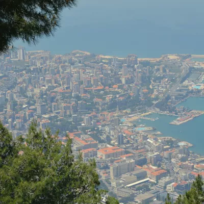 A Lebanon cityscape with a body of water in the background
