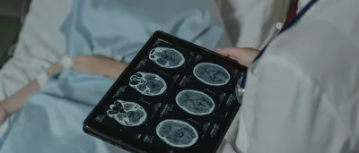 doctor consults MRI results with a patient